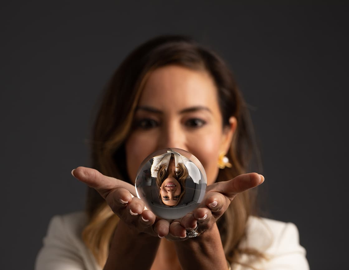 Dr. Amanda Seay holding a crystal ball